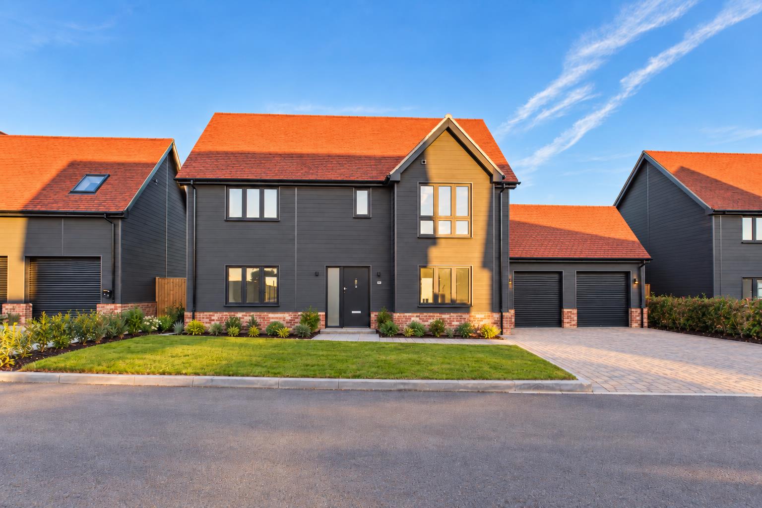Modern Charcoal Home with Recessed Garage.png